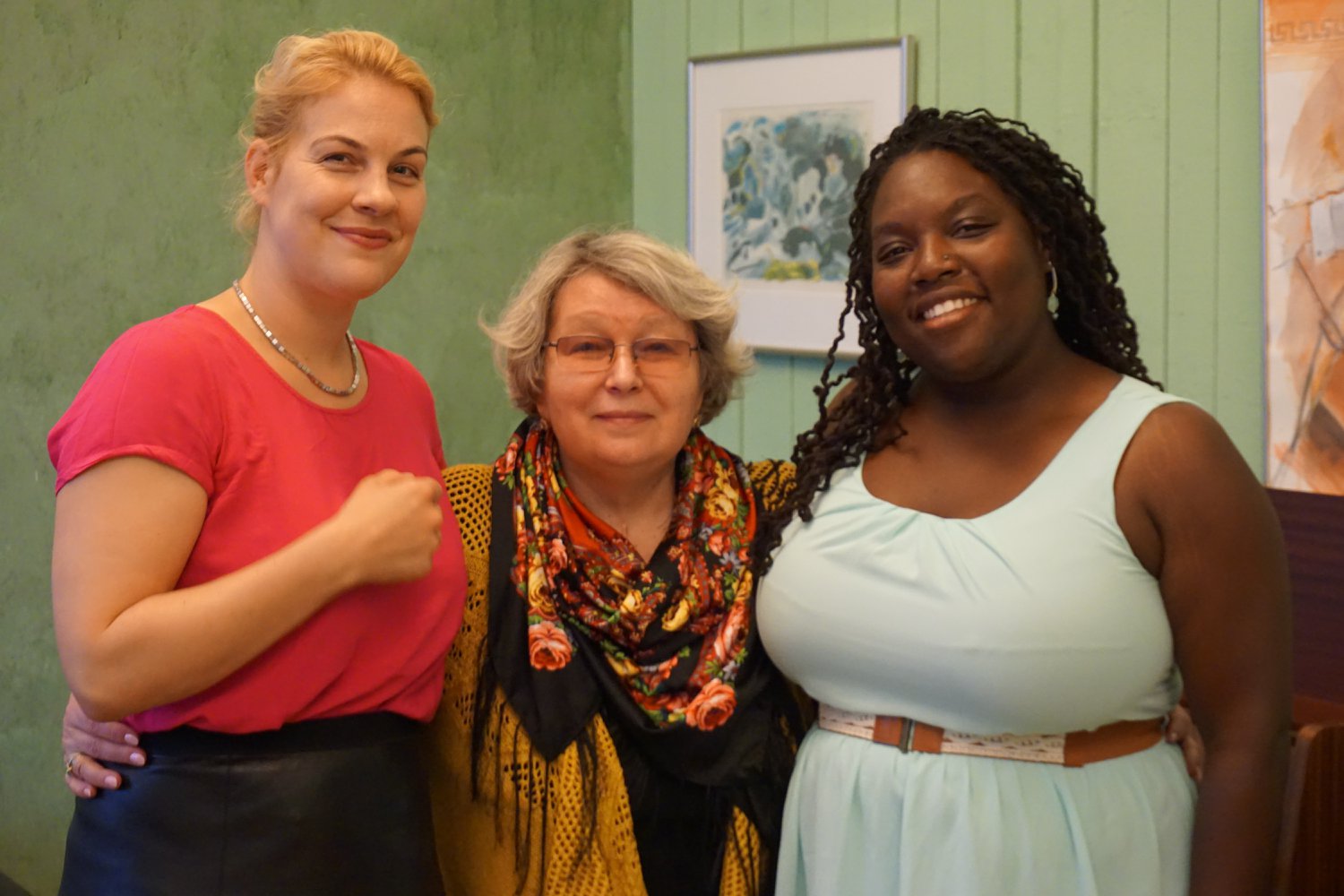 Three woman posing for a photo